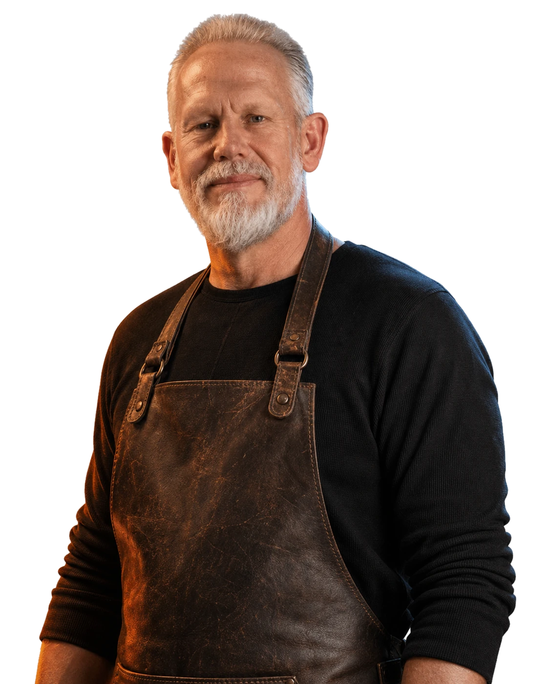Craftsman wearing a dark shirt and leather apron
